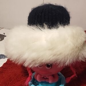 Plush Doll with Black Hat and White Fur